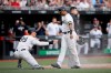 New York Yankees' Aaron Judge, left, and Aaron Hicks celebrate after scoring on a single by Gary Sanchez during the seventh inning of a baseball game against the Boston Red Sox in London, Sunday, June 30, 2019. (AP Photo/Tim Ireland)