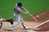 Los Angeles Dodgers' Kenta Maeda hits a two-RBI single during the second inning of a baseball game against the San Diego Padres Wednesday, Aug. 28, 2019, in San Diego. (AP Photo/Gregory Bull)