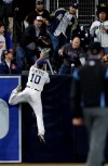 San Diego Padres left fielder Hunter Renfroe can't reach a home run by Arizona Diamondbacks' John Ryan Murphy during the fifth inning of a baseball game Tuesday, May 21, 2019, in San Diego. (AP Photo/Gregory Bull)