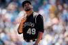 Colorado Rockies starting pitcher Antonio Senzatela gestures as he heads to the dugout after giving up a walk to Chicago Cubs' Victor Caratini in the fifth inning of a baseball game Wednesday, June 12, 2019, in Denver. (AP Photo/David Zalubowski)