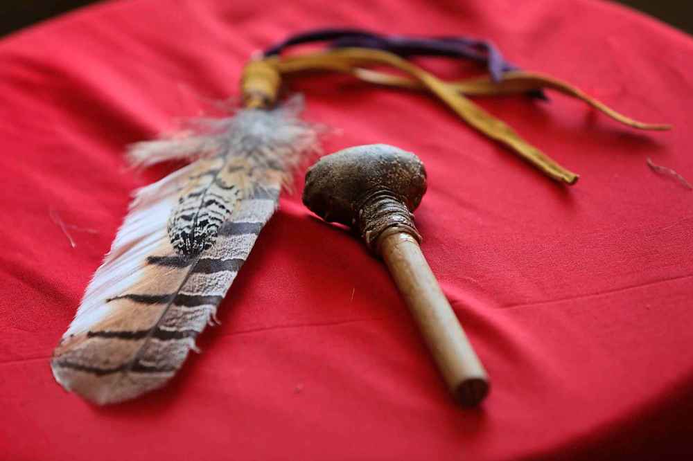 RUTH BONNEVILLE / WINNIPEG FREE PRESS
A handcrafted baby rattle and eagle feather given to families waiting to get their children back.