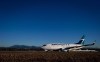 A Westjet Boeing 737-700 taxis to a gate after arriving at Vancouver International Airport in Richmond, B.C., on Monday February 3, 2014. Onex Corp. has signed a friendly deal to buy WestJet Airlines Ltd. in a deal it valued at $5 billion, including assumed debt. THE CANADIAN PRESS/Darryl Dyck