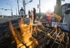 Striking CN rail members are seen outside the Mclean Rail Yard in North Vancouver., Wednesday, November, 20, 2019. Teamsters Canada says it has reached a tentative agreement with Canadian National Railway Co. to renew the collective agreement for over 3,000 conductors, trainpersons and yard workers. THE CANADIAN PRESS/Jonathan Hayward