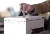 A voter casts a ballot in the 2011 federal election in Toronto on May 2, 2011. The Liberals and Conservatives are matched fairly evenly when it comes to how ready their local campaigns are to pay for the coming federal election, a shift from when the big blue machine dominated the scene the last time around. THE CANADIAN PRESS/Chris Young