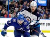 Tampa Bay Lightning centre Yanni Gourde (37) gets shoved off the puck by Winnipeg Jets defenceman Nathan Beaulieu (88) during the second period of an NHL hockey game Tuesday, March 5, 2019, in Tampa, Fla. The Winnipeg Jets shored up their blue-line depth Monday, signing defenceman Nathan Beaulieu to a one-year contract worth US$1 million. THE CANADIAN PRESS/AP, Chris O'Meara