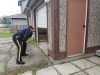 An RCMP officer shines a light into an open garage at a home in the Gillam, Man., area in July 27, 2019, police image published to social media. THE CANADIAN PRESS/HO-Twitter, Royal Canadian Mounted Police, @rcmpmb, *MANDATORY CREDIT*