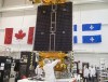 Technicians put the final touches on the second of three Radarsat Constellation Mission satellites at the MDA facility in Montreal on June 21, 2018. A trio of Canadian satellites that represent the next generation of Earth-observation technology launched successfully into orbit today and will be deployed soon. The Canadian government's RADARSAT Constellation project blasted off aboard a SpaceX rocket from the Vandenberg Air Force Base in California at 10:17 a.m. ET. THE CANADIAN PRESS/Ryan Remiorz