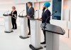 An empty podium is seen as Green Party Leader Elizabeth May, left, Conservative Leader Andrew Scheer, centre, and NDP Leader Jagmeet Singh get ready to take part during the Maclean's/Citytv National Leaders Debate in Toronto on Thursday, September 12, 2019. The group responsible for producing two televised leaders' debates says the events will focus on five distinct issues, with some variation between the French and English events. THE CANADIAN PRESS/Frank Gunn