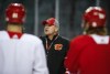 Calgary Flames' head coach Bill Peters talks to players during practice in Calgary, Tuesday, April 9, 2019. THE CANADIAN PRESS/Jeff McIntosh