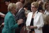 Former Liberal MP Judy Sgro, left, speaks with Ontario Premier Kathleen Wynne as guests assemble for the installation of Canada's next Governor General, Julie Payette, in Ottawa on Monday, October 2, 2017. Sgro said she is sorry for saying her black constituents told her they loved Justin Trudeau even more after learning he wore blackface, arguing the media had blown it out of proportion even though the Liberal leader has apologized again and again for the incidents.THE CANADIAN PRESS/Adrian Wyld
