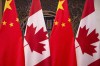 This Dec. 5, 2017, photo shows flags of Canada and China prior to a meeting of Canadian Prime Minister Justin Trudeau and Chinese President Xi Jinping at the Diaoyutai State Guesthouse in Beijing.The Chinese government is accusing Prime Minister Justin Trudeau of being naive in assuming that President Donald Trump did him any favours by raising the case of two imprisoned Canadians with President Xi Jinping. THE CANADIAN PRESS/AP, Fred Dufour, Pool Photo