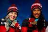 Bronze medallists in the women's two-man bobsled Kaillie Humphries and Phylicia George, of Canada, smile during the medals ceremony at the 2018 Winter Olympics in Pyeongchang, South Korea, Thursday, Feb. 22, 2018. A Calgary judge is expected to rule on whether Bobsleigh Canada Skeleton must release Humphries to compete for another country. THE CANADIAN PRESS/AP/Patrick Semansky