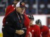 Calgary Flames head coach Bill Peters gives instruction during training camp in Calgary, Friday, Sept. 13, 2019. The Calgary Flames say they are looking into recent allegations made by a former NHL player that head coach Bill Peters used a racial slur against him 10 years ago. Defenceman Akim Aliu tweeted on Monday night that he had racism directed his way by a former coach in 2009-10 while a member of the American Hockey League's Rockford IceHogs. THE CANADIAN PRESS/Jeff McIntosh