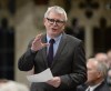 Parliamentary Secretary to the Minister of Families, Children and Social Development Adam Vaughan rises during Question Period in the House of Commons on Parliament Hill, in Ottawa on Friday, March 24, 2017. The Liberals have filed a complaint about allegedly illegal advertising by the Canadian Shooting Sports Association during the federal election campaign.THE CANADIAN PRESS/Justin Tang