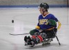 Humboldt Broncos hockey player Ryan Straschnitzki flips a puck before a sled hockey scrimmage at the Edge Ice Arena in Littleton, Colo., on Friday, Nov. 23, 2018. At the end of a long and difficult year, Ryan Straschnitzki is on the ice and his hockey dream is intact. Straschnitzki and his Humboldt Broncos teammates were on their way to a Saskatchewan Junior Hockey League playoff game last April when tragedy struck. A semi-trailer drove through a stop sign and into the path of their bus at an intersection. Sixteen people died and 13 others, including Ryan, had their lives changed forever. Straschnitzki, paralyzed from the chest down, had hoped to play university hockey or, if fortune favoured him, make it to the National Hockey League. Now his entire focus is on playing for Canada on the national sledge hockey team. THE CANADIAN PRESS/Joe Mahoney