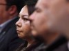 Sheila North Wilson, grand chief of Manitoba Keewatinowi Okimakanak, listens to an RCMP announcement at a press conference in Winnipeg, Friday, March 18, 2016. Helicopters and a specialized military aircraft scoured from the air while armed police took to the ground over northern Manitoba in a hunt for two suspects of murders in British Columbia. Some advocates say it's a stark contrast to resources applied to searches for missing and murdered Indigenous women and girls. THE CANADIAN PRESS/John Woods