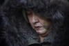 Thelma Favel, Tina Fontaine's great-aunt and the woman who raised her, sheds tears during a march the day after the jury delivered a not-guilty verdict in the 2nd degree murder trial of Raymond Cormier, in Winnipeg, Friday, Feb. 23, 2018. The highly anticipated report from Manitoba Advocate for Children and Youth Daphne Penrose will be released on Tuesday and is expected to detail Tina's interactions with the child-welfare system, police, and others before she went missing. It will also provide recommendations to avoid future deaths. THE CANADIAN PRESS/John Woods