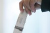 A woman casts her ballot in the riding of Vaudreuil-Soulanges, west of Montreal, on election day, Monday, Oct. 19, 2015. THE CANADIAN PRESS IMAGES/Graham Hughes