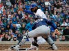 Milwaukee Brewers catcher Yasmani Grandal, right, tags out Chicago Cubs' Jason Heyward at home during the first inning of a baseball game Saturday, May 11, 2019, in Chicago. (AP Photo/Nam Y. Huh)