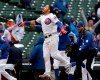 Chicago Cubs' Willson Contreras celebrates as he heads home with the game-winning solo home run against the Milwaukee Brewers during the 15th inning of a baseball game Saturday, May 11, 2019, in Chicago. The Cubs won 2-1. (AP Photo/Nam Y. Huh)