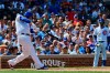Chicago Cubs' Anthony Rizzo hits an RBI single during the fourth inning of a baseball game against the San Francisco Giants Thursday, Aug. 22, 2019, in Chicago. (AP Photo/Matt Marton)