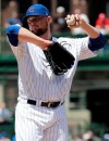 Chicago Cubs starting pitcher Jon Lester reacts after Philadelphia Phillies' Scott Kingery hit a single during the first inning of a baseball game Thursday, May 23, 2019, in Chicago. (AP Photo/Nam Y. Huh)