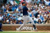Milwaukee Brewers' Orlando Arcia watches his RBI ground ball during the fourth inning of a baseball game against the Chicago Cubs Sunday, Sept. 1, 2019, in Chicago. (AP Photo/Paul Beaty)