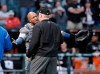 Kansas City Royals catcher Martin Maldonado, left, appeals to umpire crew chief Bill Miller after home plate umpire Mark Carlson ejected starting pitcher Glenn Sparkman for hitting Chicago White Sox's Tim Anderson with a pitch during the second inning of a baseball game Wednesday, May 29, 2019, in Chicago. (AP Photo/Charles Rex Arbogast)