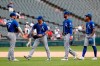 Kansas City Royals' Hunter Dozier (17) celebrate with teammates the team's win over the Chicago White Sox after a baseball game Thursday, Sept. 12, 2019, in Chicago. (AP Photo/Charles Rex Arbogast)