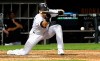CORRECTS TO EIGHTH INNING, INSTEAD OF NINTH - Chicago White Sox's Ryan Cordell hits a sacrifice bunt during the eighth inning of the team's baseball game against the Toronto Blue Jays on Thursday, May 16, 2019, in Chicago. (AP Photo/Matt Marton)