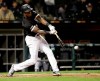 Chicago White Sox's Tim Anderson hits an RBI double off Kansas City Royals relief pitcher Ian Kennedy during the eighth inning of a baseball game Wednesday, May 29, 2019, in Chicago. The White Sox won 8-7. (AP Photo/Charles Rex Arbogast)