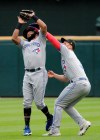 Toronto Blue Jays second baseman Richard Urena, left, and right fielder Brandon Drury collide as Urena makes a catch a fly ball by Chicago White Sox's James McCann during the third inning of a baseball game in Chicago, Saturday, May 18, 2019. (AP Photo/Nam Y. Huh)