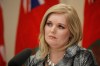 CP
Family Services Minister Kerri Irvin-Ross listens to media question regarding the release of the Phoenix Sinclair Inquiry Report at the Manitoba Legislature in Winnipeg, Friday, January 31, 2014. Irvin-Ross acknowledged the failure of the child welfare system to protect Phoenix Sinclair and will act on the recommendations of Commissioner Ted Hughes' inquiry.