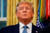 President Donald Trump stands during a ceremony to present the Presidential Medal of Freedom to former Attorney General Edwin Meese, in the Oval Office of the White House, Tuesday, Oct. 8, 2019, in Washington. (AP Photo/Alex Brandon)