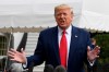 President Donald Trump talks to reporters on the South Lawn of the White House in Washington, Friday, Oct. 25, 2019, before boarding Marine One for the short trip to Andrews Air Force Base. Trump is heading to South Carolina to speak at Benedict College in Columbia. (AP Photo/Susan Walsh)