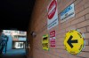 Signs point towards an advance voting poll location at the electoral district of Toronto Centre at Muriel Collins Housing Cooperative in Toronto on Friday Oct. 11, 2019. THE CANADIAN PRESS/Doug Ives