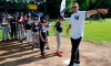 Young fans queue as Yankee manager Aaron Boone points during a private Baseball Clinic in London, Thursday, June 27, 2019. The Yankees are hosting for approximately 100 youth in the London community in conjunction with the London Meteorites Baseball and Softball Club this private Baseball Clinic. (AP Photo/Frank Augstein)