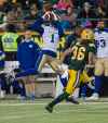 AMBER BRACKEN / THE CANADIAN PRESS
Winnipeg Blue Bombers Darvin Adams (1) catches a pass under pressure from Edmonton Eskimos Aaron Grymes (36) during second half CFL action in Edmonton, Alta., on Saturday September 29, 2018.