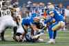 Adam Bighill forces Hamilton Tiger-Cats' Alex Green to fumble in the first half. (John Woods / The Canadian Press)