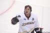 Martti Kainulainen / The Associated Press
Anaheim Ducks forward Teemu Selanne throws pucks to spectators as he warms up ahead of an NHL season opener in Helsinki, Finland in October.