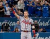 Atlanta Braves' Josh Donaldson acknowledges fans prior to the start of their Interleague MLB baseball game against the Blue Jays in Toronto Tuesday August 27, 2019. Donaldson, who spent four years as a Blue Jay, returned to Toronto Tuesday with his new team — the Atlanta Braves — for the first time since being shipped off to Cleveland. THE CANADIAN PRESS/Fred Thornhill