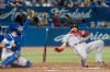Atlanta Braves' Josh Donaldson is knocked down by a pitch from Toronto Blue Jays relief pitcher Derek Law in the seventh inning of their Interleague MLB baseball game in Toronto Tuesday August 27, 2019. THE CANADIAN PRESS/Fred Thornhill