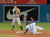 Toronto Blue Jays' Lourdes Gurriel Jr. is out on the force out at second base as New York Yankees' DJ LeMahieu turns the double play in the ninth inning of their American League MLB baseball game in Toronto Thursday June 6, 2019. THE CANADIAN PRESS/Fred Thornhill