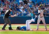 Toronto Blue Jays Vladimir Guerrero Jr. out at third base as Houston Astros Abraham Toro applies the tag and umpire Mike Estabrook calls him out in the third inning of their American League MLB baseball game in Toronto on Saturday, August 31, 2019. THE CANADIAN PRESS/Fred Thornhill