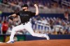 Miami Marlins starting pitcher Caleb Smith delivers during the first inning of the team's baseball game against the Atlanta Braves on Friday, Aug. 9, 2019, in Miami. (AP Photo/Brynn Anderson)