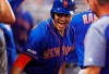 New York Mets' Michael Conforto celebrates in the dugout after a two-run home run during the third inning of a baseball game against the Miami Marlins, Saturday, July 13, 2019, in Miami. (AP Photo/Brynn Anderson)