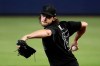 Philadelphia Phillies starting pitcher Aaron Nola winds up to deliver during the first inning of a baseball game against the Miami Marlins, Sunday, Aug. 25, 2019, in Miami. (AP Photo/Lynne Sladky)