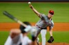 Cincinnati Reds' Anthony DeSclafani pitches to Miami Marlins' Garrett Cooper during the first inning of a baseball game, Wednesday, Aug. 28, 2019, in Miami. (AP Photo/Wilfredo Lee)