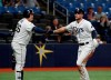 Tampa Bay Rays' Austin Meadows, right, celebrates with teammate Ji-Man Choi after scoring during the fourth inning of a baseball game against the Toronto Blue Jays, Thursday, Sept. 5, 2019, in St. Petersburg, Fla. (AP Photo/Scott Audette)
