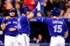 Toronto Blue Jays left fielder Randal Grichuk (15) celebrates with Justin Smoak (14) after Grichuk hit a three run home run to centre field during first inning American League baseball action against the Chicago White Sox in Toronto on Friday, May 10, 2019. THE CANADIAN PRESS/Frank Gunn
